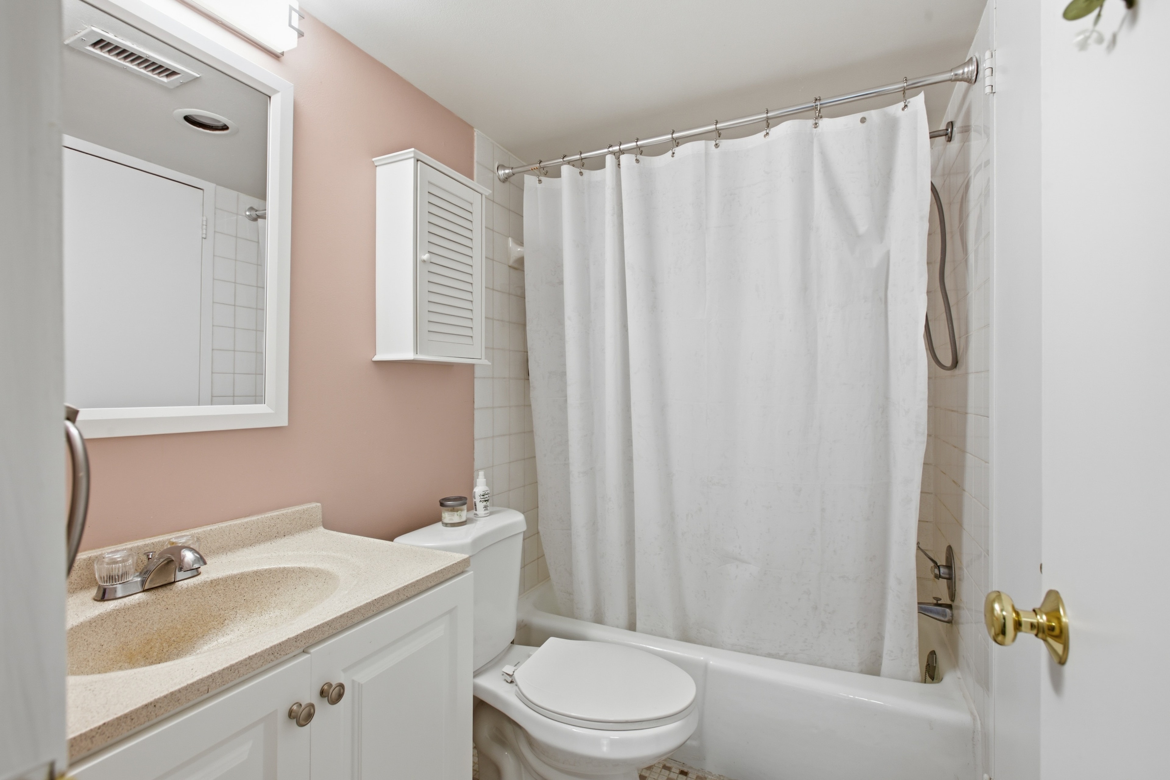 Updated bathroom with vanity and tub