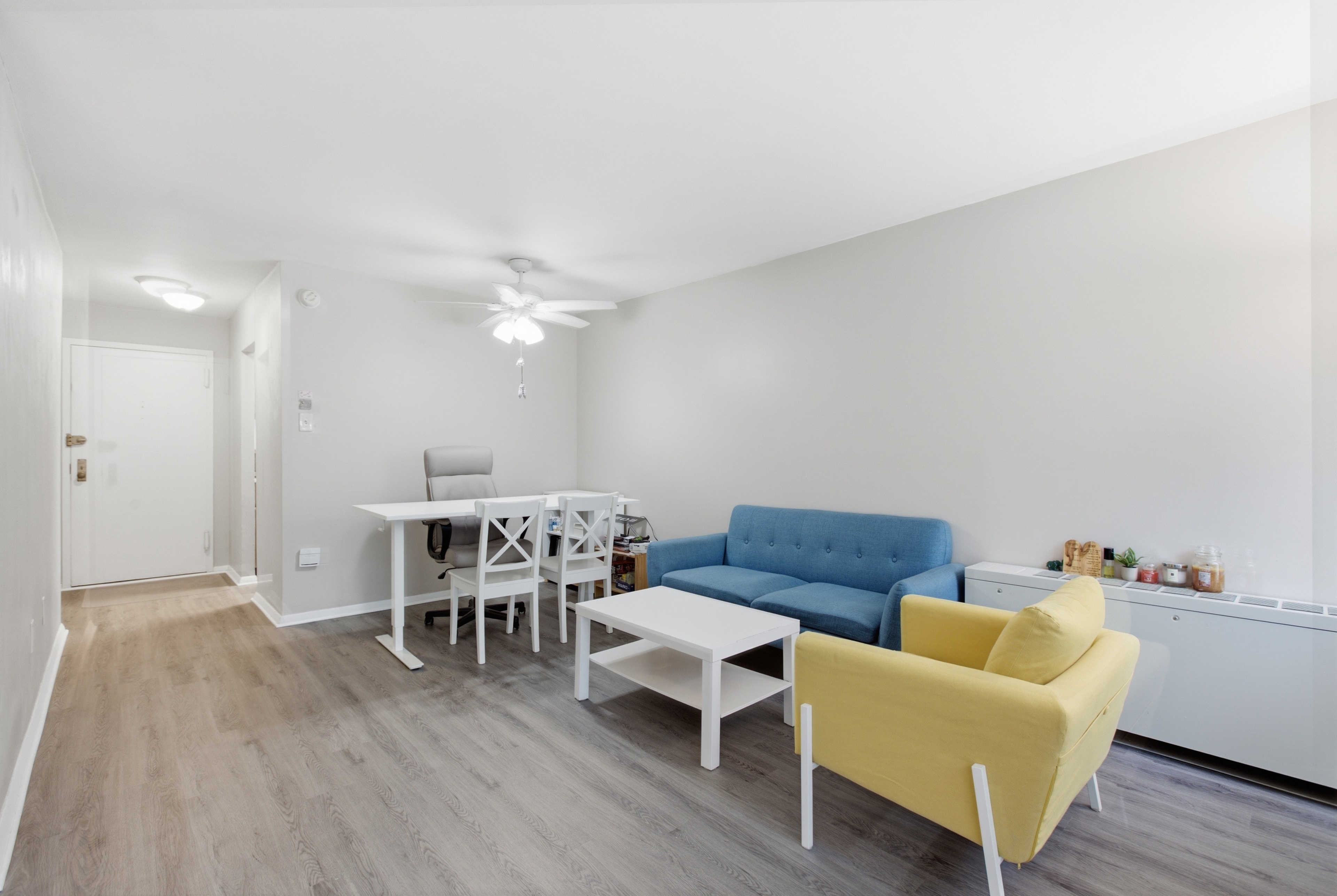 Living and dining area with ceiling fan