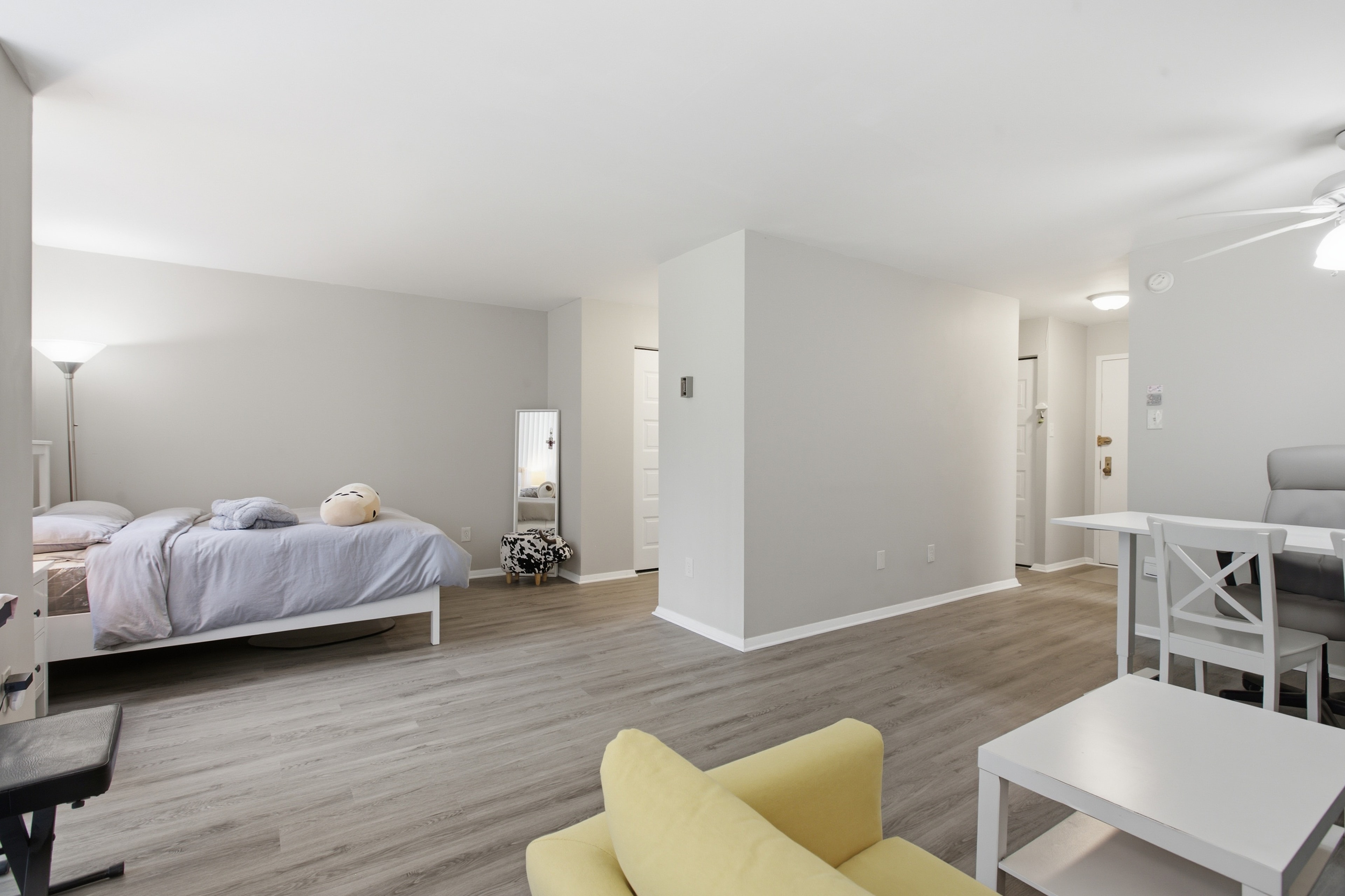 Open-concept living space with luxury vinyl plank flooring