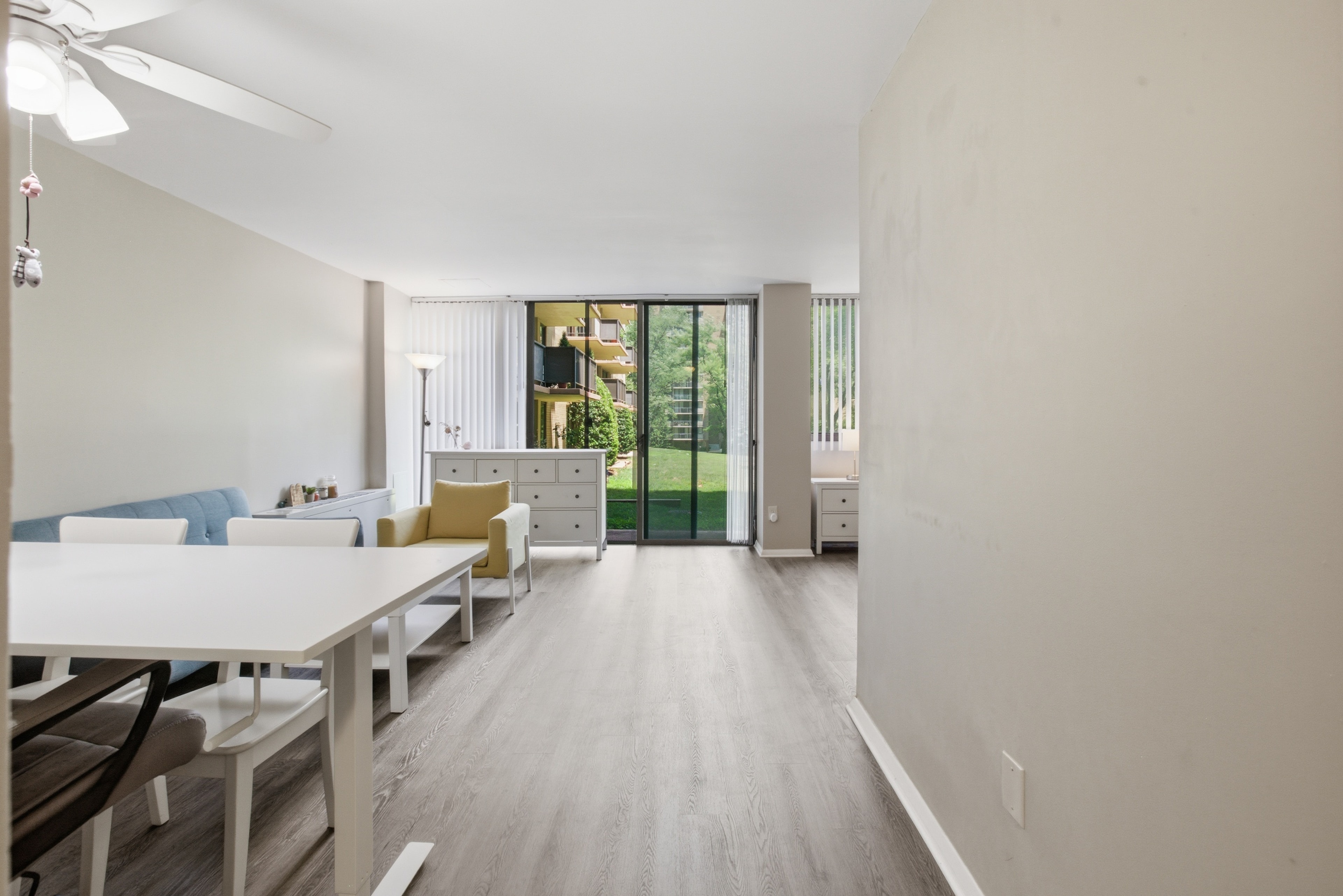 Open layout with sliding glass doors to private patio